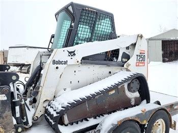 used skid steer attachments saskatchewan|sask skid steers for sale.